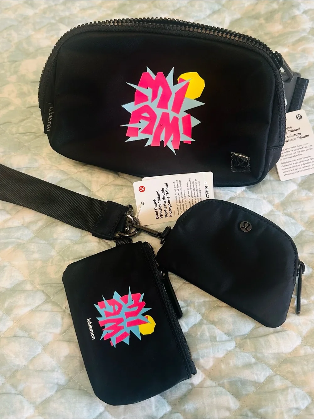 lululemon athletica Black Wristlet Set with Pink, Teal & Yellow Graphic